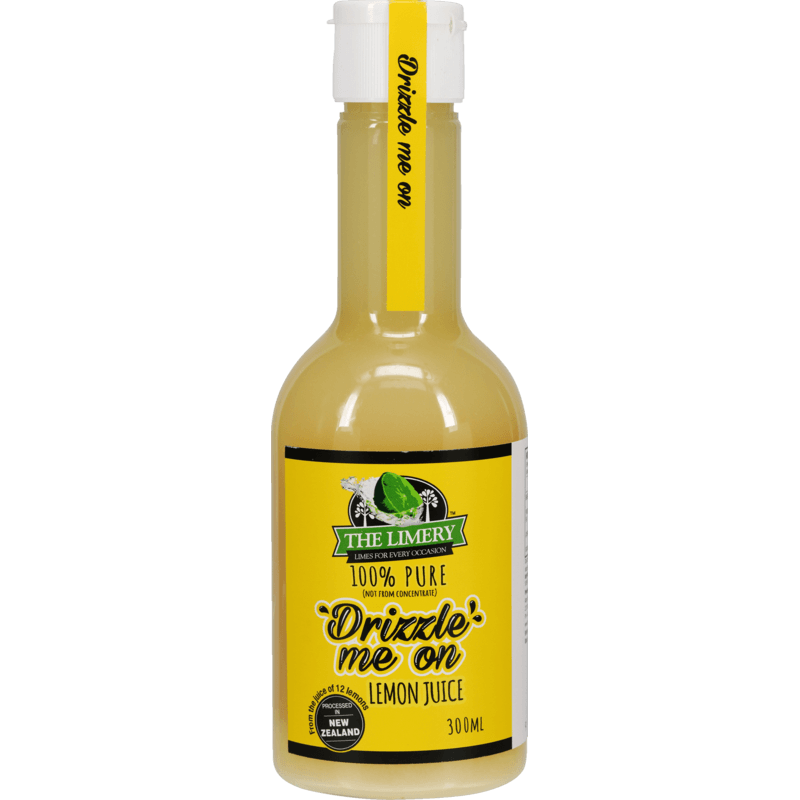 Bottle of lemon juice with a yellow label on a white background