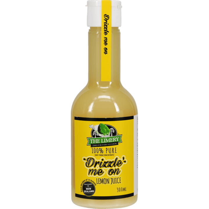 Bottle of lemon juice with a yellow label on a white background
